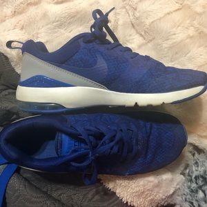 Blue Nike tennis shoes
